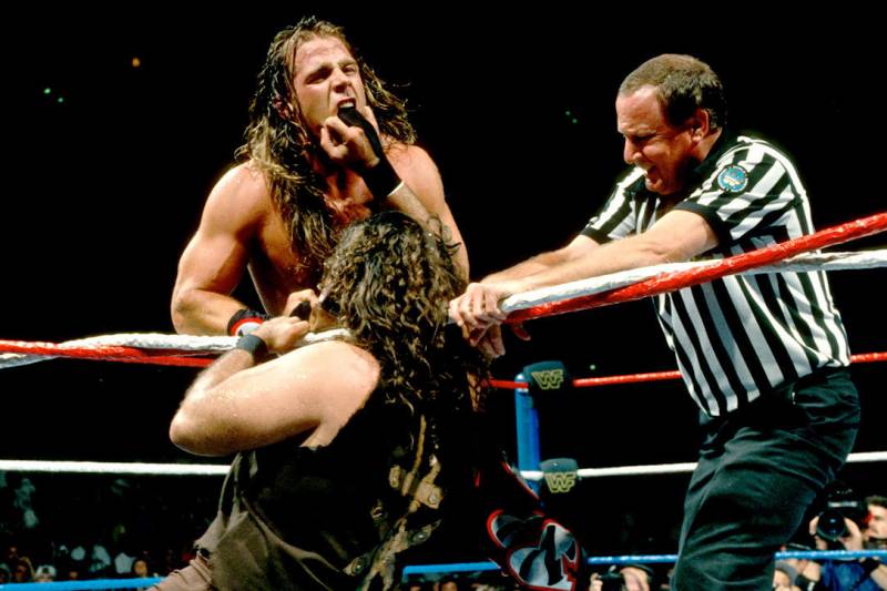 Shawn Michaels y Mankind.